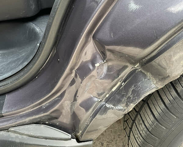 Серый Мицубиси Аутлендер, объемом двигателя 2 л и пробегом 264 тыс. км за 9500 $, фото 8 на Automoto.ua