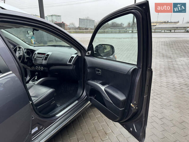 Серый Мицубиси Аутлендер, объемом двигателя 2.2 л и пробегом 230 тыс. км за 11000 $, фото 14 на Automoto.ua