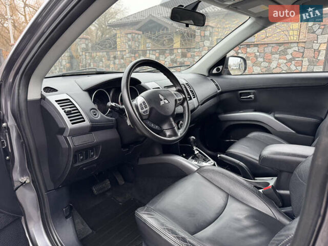 Серый Мицубиси Аутлендер, объемом двигателя 2.2 л и пробегом 289 тыс. км за 11300 $, фото 41 на Automoto.ua