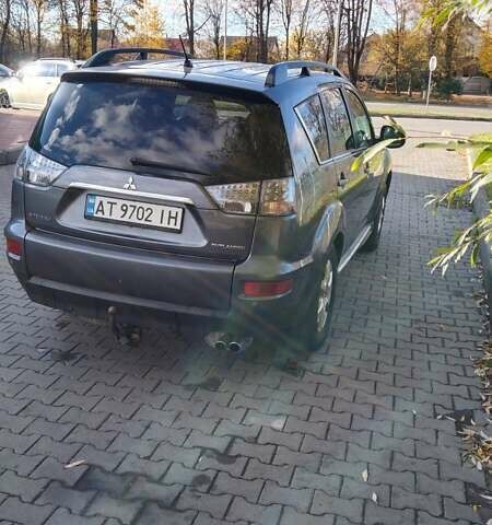 Серый Мицубиси Аутлендер, объемом двигателя 2.3 л и пробегом 294 тыс. км за 9600 $, фото 4 на Automoto.ua
