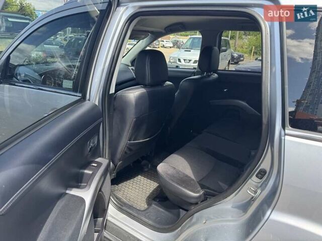 Серый Мицубиси Аутлендер, объемом двигателя 2.2 л и пробегом 223 тыс. км за 11500 $, фото 7 на Automoto.ua