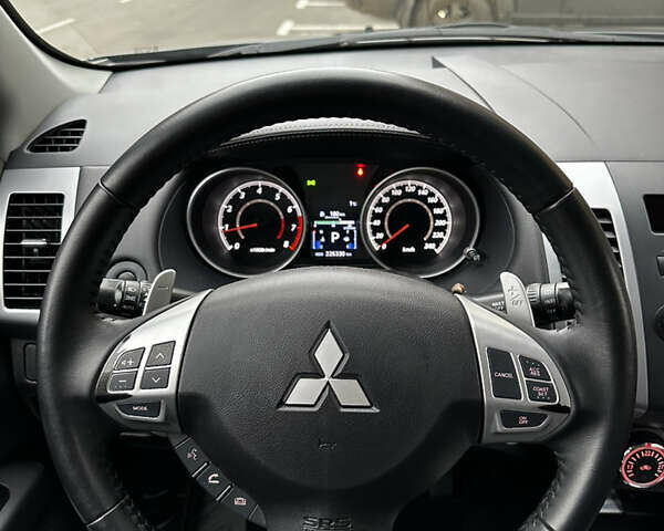 Серый Мицубиси Аутлендер, объемом двигателя 2.4 л и пробегом 226 тыс. км за 10200 $, фото 26 на Automoto.ua