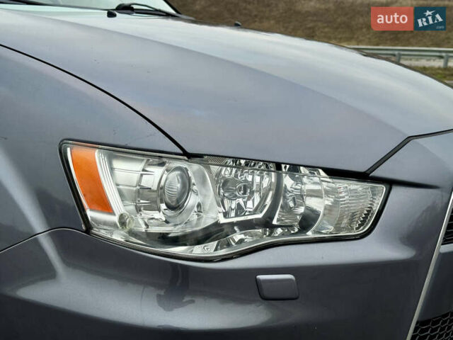 Серый Мицубиси Аутлендер, объемом двигателя 2.2 л и пробегом 160 тыс. км за 11350 $, фото 10 на Automoto.ua