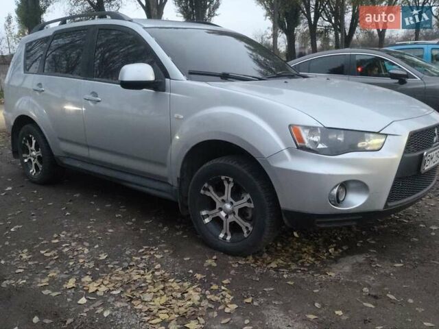 Серый Мицубиси Аутлендер, объемом двигателя 2 л и пробегом 205 тыс. км за 9600 $, фото 7 на Automoto.ua