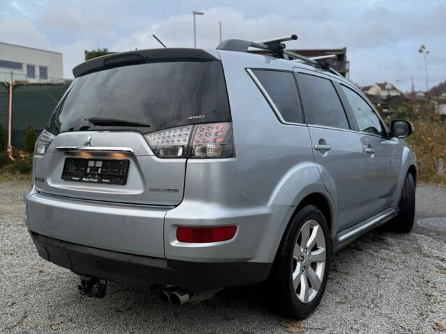 Серый Мицубиси Аутлендер, объемом двигателя 2.3 л и пробегом 279 тыс. км за 4642 $, фото 2 на Automoto.ua