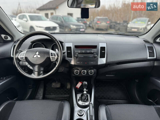 Серый Мицубиси Аутлендер, объемом двигателя 2.2 л и пробегом 211 тыс. км за 11999 $, фото 26 на Automoto.ua