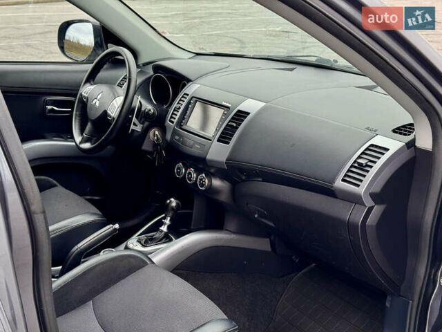 Міцубісі Аутлендер 2011 у Полтаві на Automoto.ua Сірий Міцубісі Аутлендер, об'ємом двигуна 2.2 л та пробігом 252 тис. км за 11150 $, фото 29 на Automoto.ua