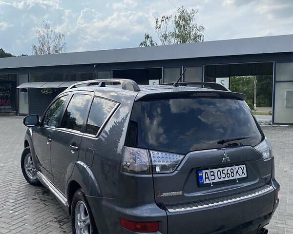 Серый Мицубиси Аутлендер, объемом двигателя 2.27 л и пробегом 220 тыс. км за 11300 $, фото 3 на Automoto.ua