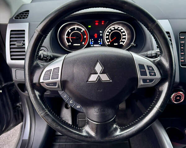 Серый Мицубиси Аутлендер, объемом двигателя 2.2 л и пробегом 160 тыс. км за 11350 $, фото 20 на Automoto.ua