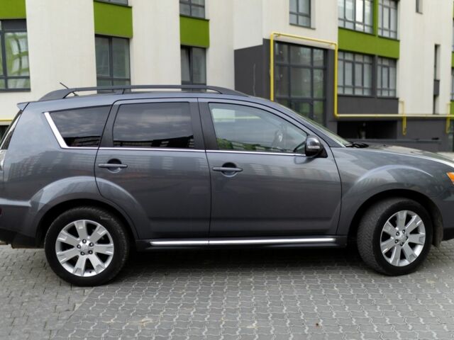 Серый Мицубиси Аутлендер, объемом двигателя 2.3 л и пробегом 288 тыс. км за 9700 $, фото 6 на Automoto.ua