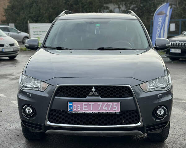 Серый Мицубиси Аутлендер, объемом двигателя 2.2 л и пробегом 211 тыс. км за 11999 $, фото 1 на Automoto.ua