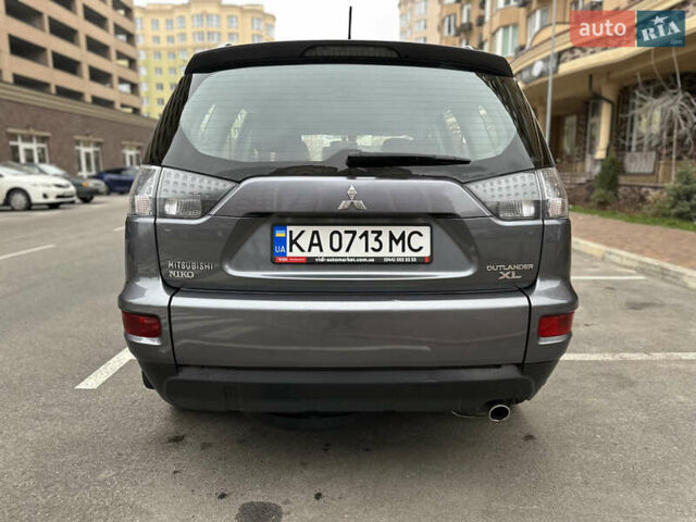 Серый Мицубиси Аутлендер, объемом двигателя 2.4 л и пробегом 226 тыс. км за 10200 $, фото 7 на Automoto.ua