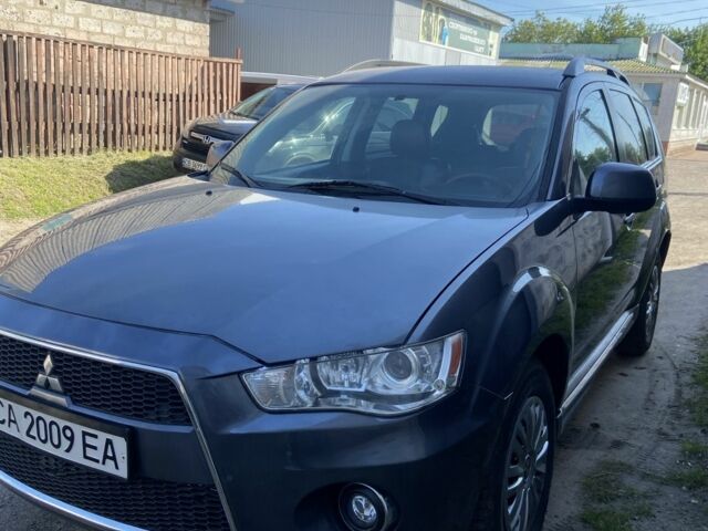 Серый Мицубиси Аутлендер, объемом двигателя 2.2 л и пробегом 240 тыс. км за 10500 $, фото 3 на Automoto.ua
