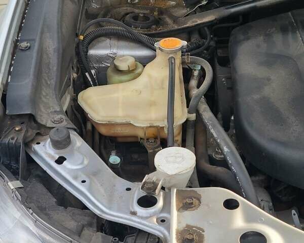 Серый Мицубиси Аутлендер, объемом двигателя 2.2 л и пробегом 175 тыс. км за 10999 $, фото 16 на Automoto.ua