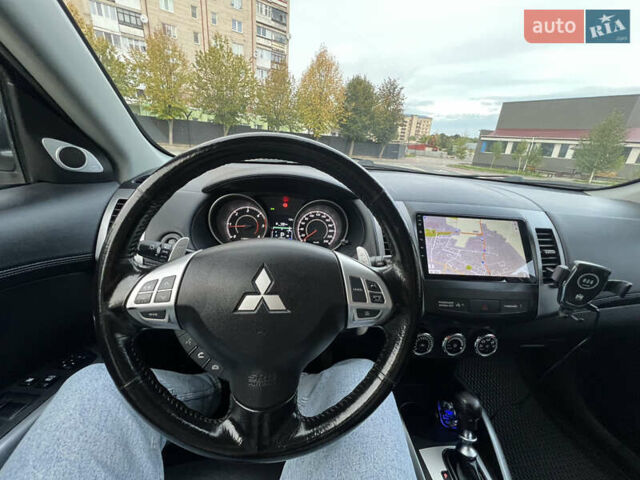 Серый Мицубиси Аутлендер, объемом двигателя 2.18 л и пробегом 220 тыс. км за 10999 $, фото 39 на Automoto.ua
