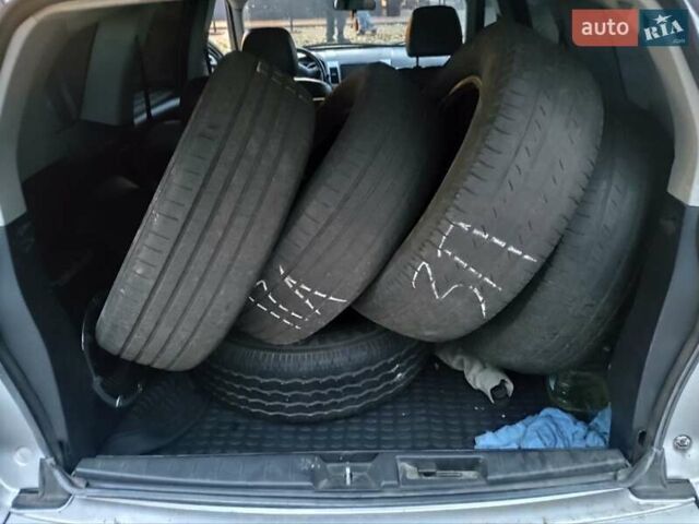 Серый Мицубиси Аутлендер, объемом двигателя 2 л и пробегом 205 тыс. км за 9600 $, фото 11 на Automoto.ua