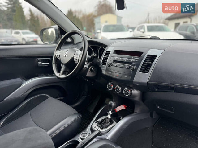 Серый Мицубиси Аутлендер, объемом двигателя 2.2 л и пробегом 211 тыс. км за 11999 $, фото 22 на Automoto.ua