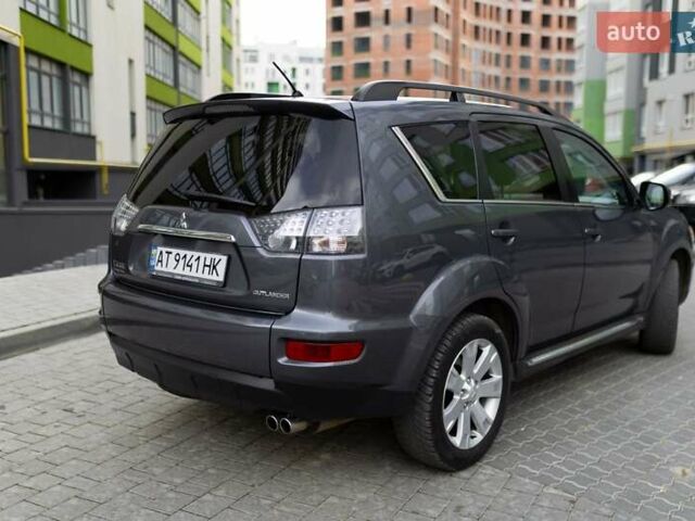 Серый Мицубиси Аутлендер, объемом двигателя 2.27 л и пробегом 291 тыс. км за 9700 $, фото 18 на Automoto.ua