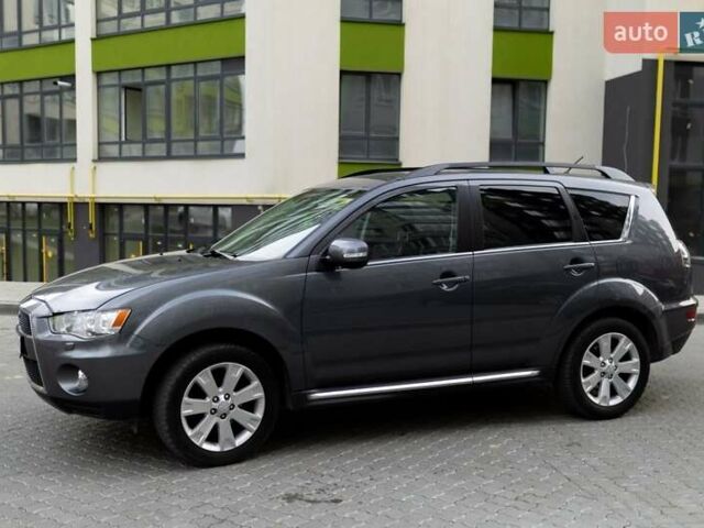 Серый Мицубиси Аутлендер, объемом двигателя 2.27 л и пробегом 291 тыс. км за 9700 $, фото 1 на Automoto.ua