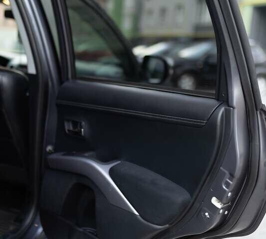 Серый Мицубиси Аутлендер, объемом двигателя 2.27 л и пробегом 291 тыс. км за 9700 $, фото 12 на Automoto.ua