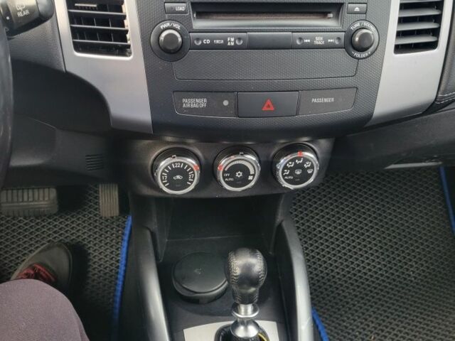 Серый Мицубиси Аутлендер, объемом двигателя 2.2 л и пробегом 175 тыс. км за 10999 $, фото 9 на Automoto.ua