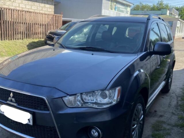 Серый Мицубиси Аутлендер, объемом двигателя 2.2 л и пробегом 240 тыс. км за 10500 $, фото 1 на Automoto.ua