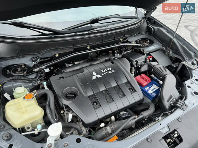 Серый Мицубиси Аутлендер, объемом двигателя 2.2 л и пробегом 160 тыс. км за 11350 $, фото 48 на Automoto.ua