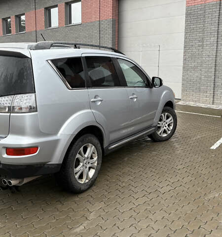 Серый Мицубиси Аутлендер, объемом двигателя 2.18 л и пробегом 233 тыс. км за 11000 $, фото 7 на Automoto.ua