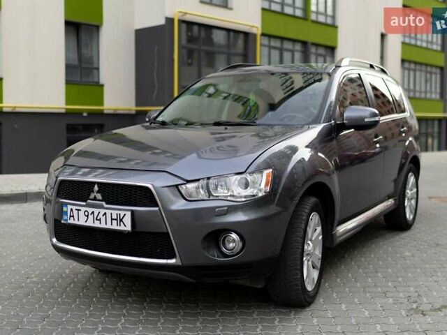 Серый Мицубиси Аутлендер, объемом двигателя 2.27 л и пробегом 291 тыс. км за 9700 $, фото 2 на Automoto.ua