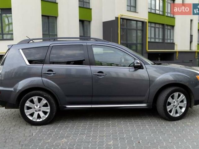 Серый Мицубиси Аутлендер, объемом двигателя 2.27 л и пробегом 291 тыс. км за 9700 $, фото 51 на Automoto.ua