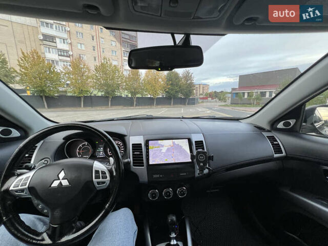 Серый Мицубиси Аутлендер, объемом двигателя 2.18 л и пробегом 220 тыс. км за 10999 $, фото 45 на Automoto.ua