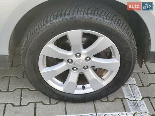 Серый Мицубиси Аутлендер, объемом двигателя 2.2 л и пробегом 175 тыс. км за 10999 $, фото 21 на Automoto.ua