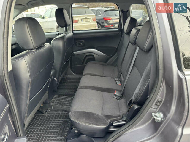 Серый Мицубиси Аутлендер, объемом двигателя 2.2 л и пробегом 211 тыс. км за 11999 $, фото 17 на Automoto.ua