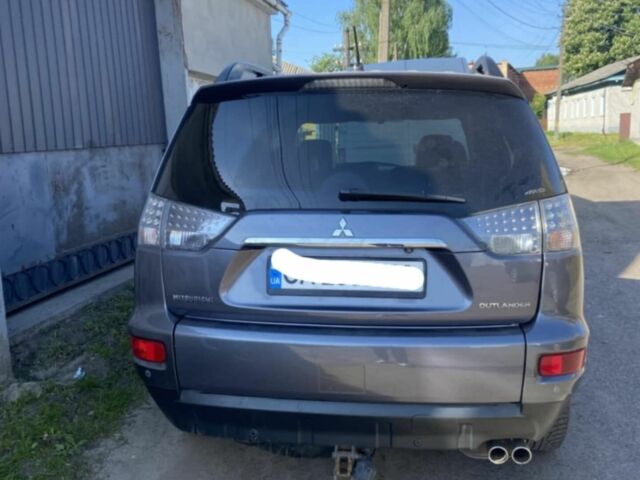 Серый Мицубиси Аутлендер, объемом двигателя 2.2 л и пробегом 240 тыс. км за 10500 $, фото 2 на Automoto.ua