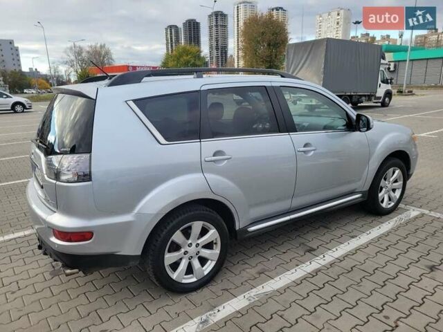 Серый Мицубиси Аутлендер, объемом двигателя 2.2 л и пробегом 175 тыс. км за 10999 $, фото 1 на Automoto.ua