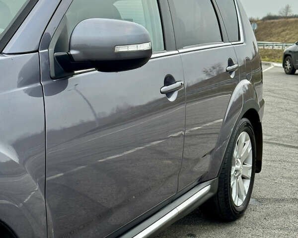 Серый Мицубиси Аутлендер, объемом двигателя 2.2 л и пробегом 160 тыс. км за 11350 $, фото 12 на Automoto.ua