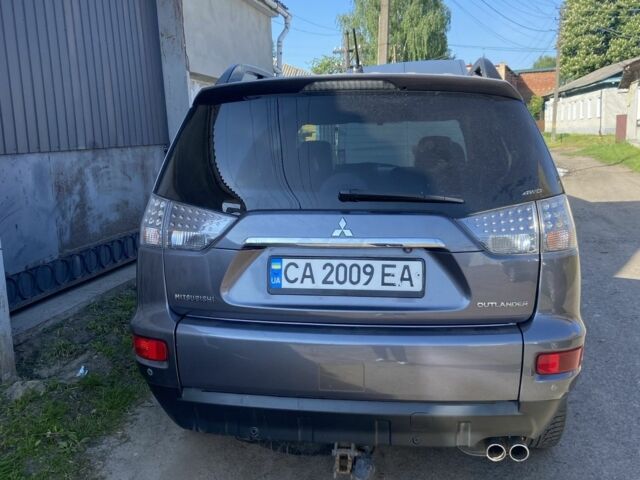 Серый Мицубиси Аутлендер, объемом двигателя 2.2 л и пробегом 240 тыс. км за 10500 $, фото 5 на Automoto.ua
