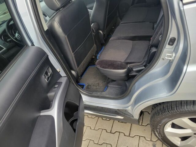 Серый Мицубиси Аутлендер, объемом двигателя 2.2 л и пробегом 175 тыс. км за 10999 $, фото 7 на Automoto.ua