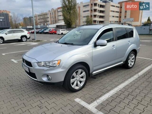 Серый Мицубиси Аутлендер, объемом двигателя 2.2 л и пробегом 175 тыс. км за 10999 $, фото 2 на Automoto.ua