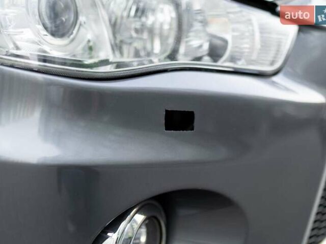 Серый Мицубиси Аутлендер, объемом двигателя 2.27 л и пробегом 291 тыс. км за 9700 $, фото 40 на Automoto.ua