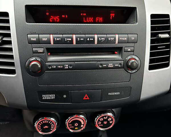 Серый Мицубиси Аутлендер, объемом двигателя 2.4 л и пробегом 226 тыс. км за 10200 $, фото 23 на Automoto.ua