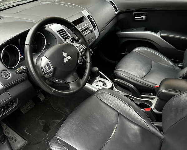 Серый Мицубиси Аутлендер, объемом двигателя 2.4 л и пробегом 226 тыс. км за 10200 $, фото 19 на Automoto.ua