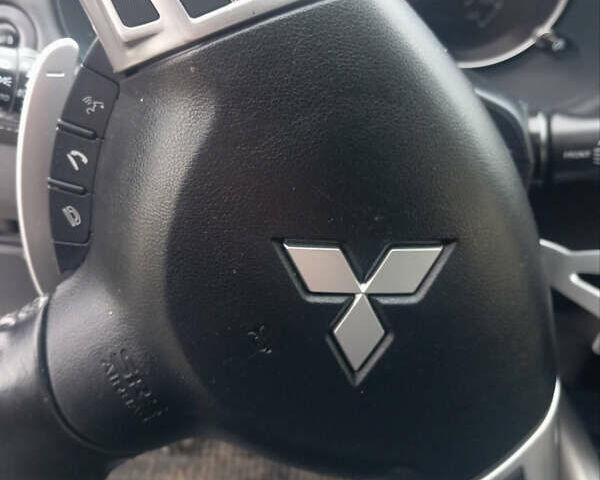 Сірий Міцубісі Аутлендер, об'ємом двигуна 2.18 л та пробігом 239 тис. км за 12000 $, фото 13 на Automoto.ua