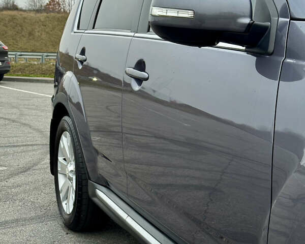 Серый Мицубиси Аутлендер, объемом двигателя 2.2 л и пробегом 160 тыс. км за 11350 $, фото 11 на Automoto.ua