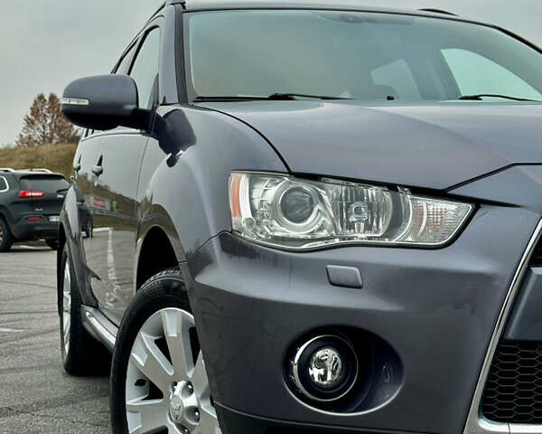 Серый Мицубиси Аутлендер, объемом двигателя 2.2 л и пробегом 160 тыс. км за 11350 $, фото 8 на Automoto.ua