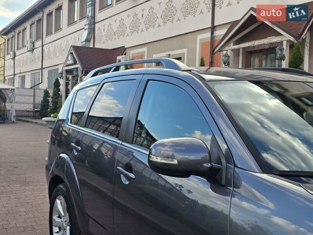 Серый Мицубиси Аутлендер, объемом двигателя 2.3 л и пробегом 207 тыс. км за 12350 $, фото 13 на Automoto.ua
