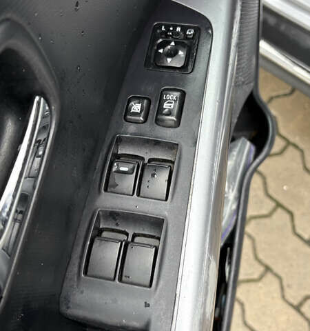 Серый Мицубиси Аутлендер, объемом двигателя 2.18 л и пробегом 233 тыс. км за 11000 $, фото 20 на Automoto.ua