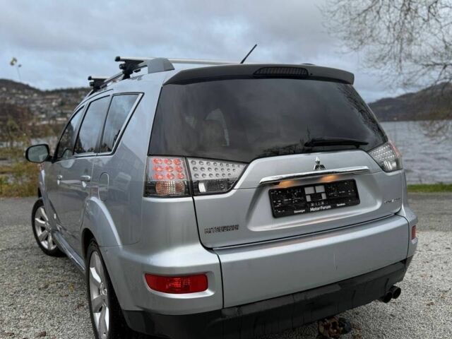Серый Мицубиси Аутлендер, объемом двигателя 2.3 л и пробегом 279 тыс. км за 4642 $, фото 1 на Automoto.ua