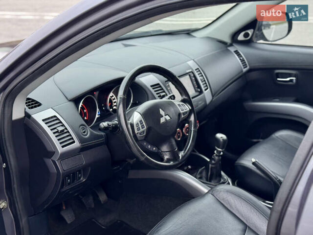 Серый Мицубиси Аутлендер, объемом двигателя 2.2 л и пробегом 160 тыс. км за 11350 $, фото 17 на Automoto.ua