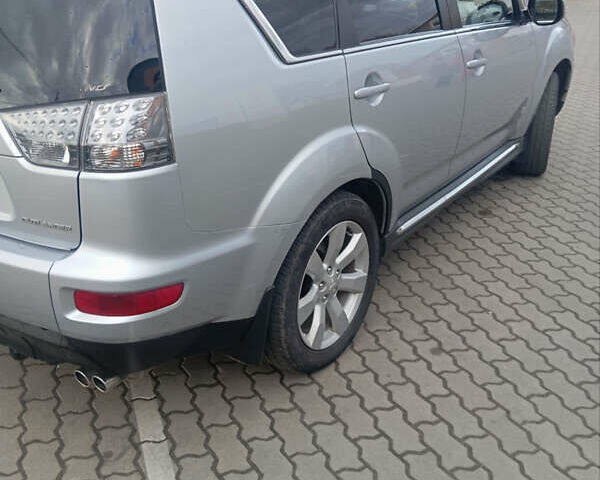 Сірий Міцубісі Аутлендер, об'ємом двигуна 2.18 л та пробігом 239 тис. км за 12000 $, фото 8 на Automoto.ua